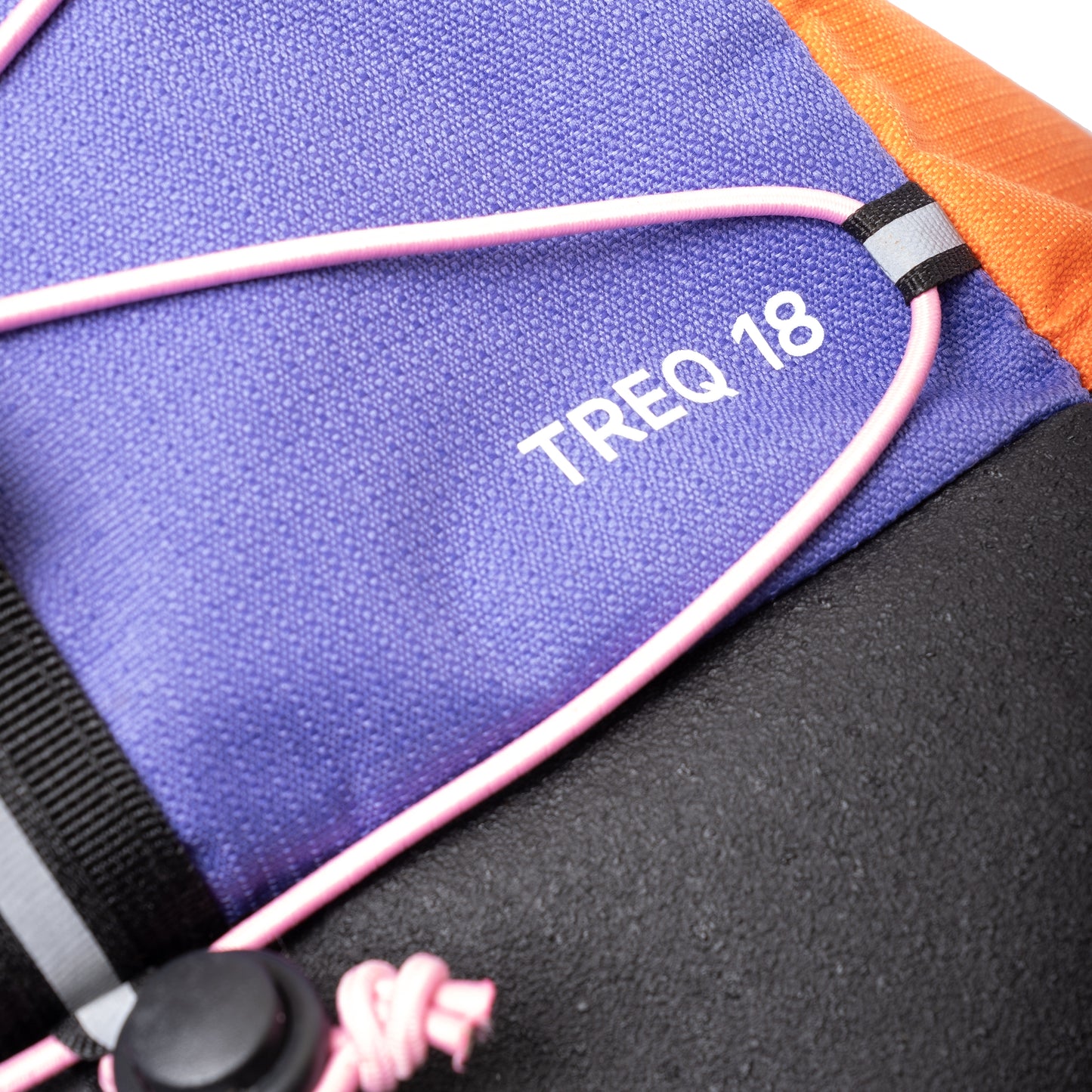 Detailed shot of the TREQ WILDFLARE Trail 22L Outdoor Backpack logo, showcasing quality and branding for avid hikers.