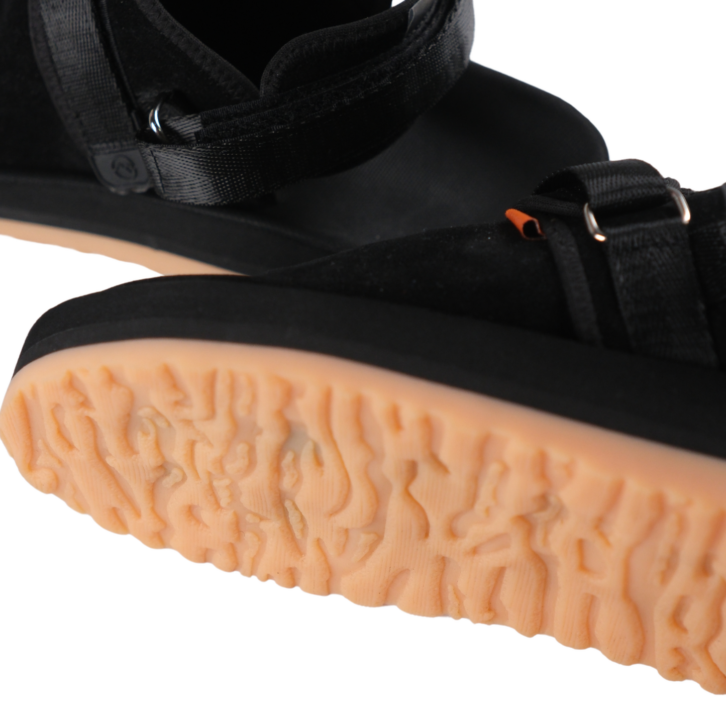 Close-up view of the outsole of Graklu Phantom Suede Lifestyle Mule Sandals highlighting the durable rubber texture for enhanced grip.