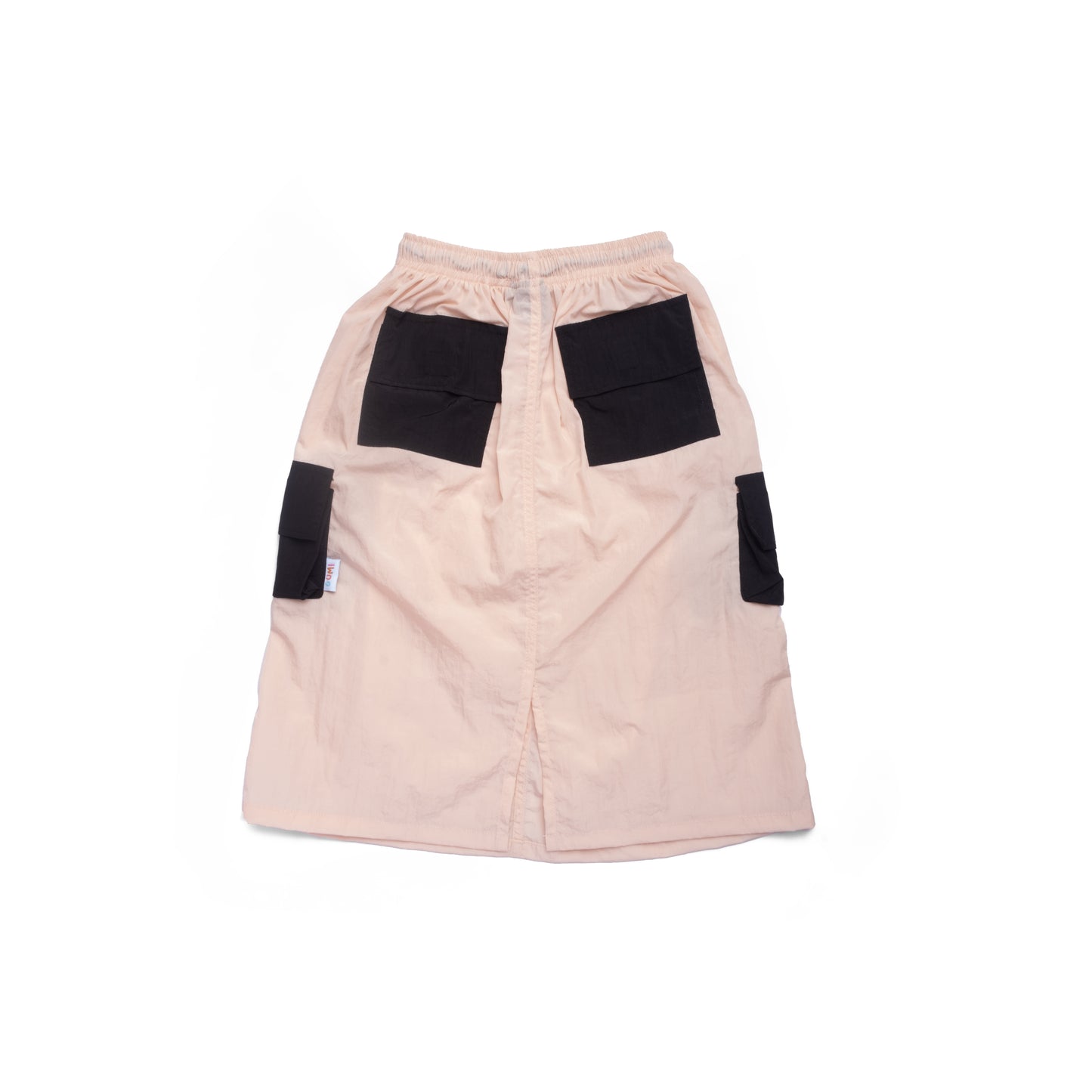 Back view of the SKERT Pastel Shadow Kids Long Cargo Skirt featuring roomy cargo pockets, ideal for little adventurers to store their treasures while playing.