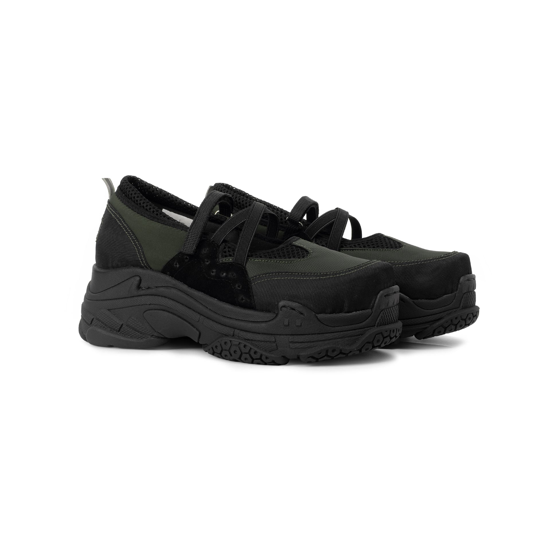Pair of TUXE Dark Terrain Woman Sneakers displaying the versatile Mary Jane style, perfect for everyday wear in black and olive tones.